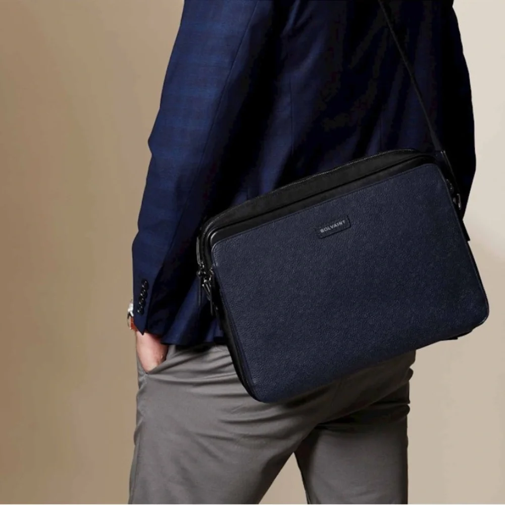 Graphite Blue/Black Trim Laptop Bag with Adjustable Strap and Textured Fabric.